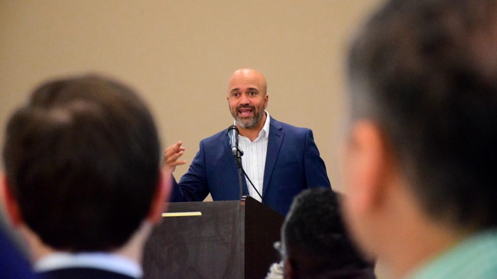 Carlos Whittaker speaks at One Generation Away's 2022 Million Meal Spring Breakfast
