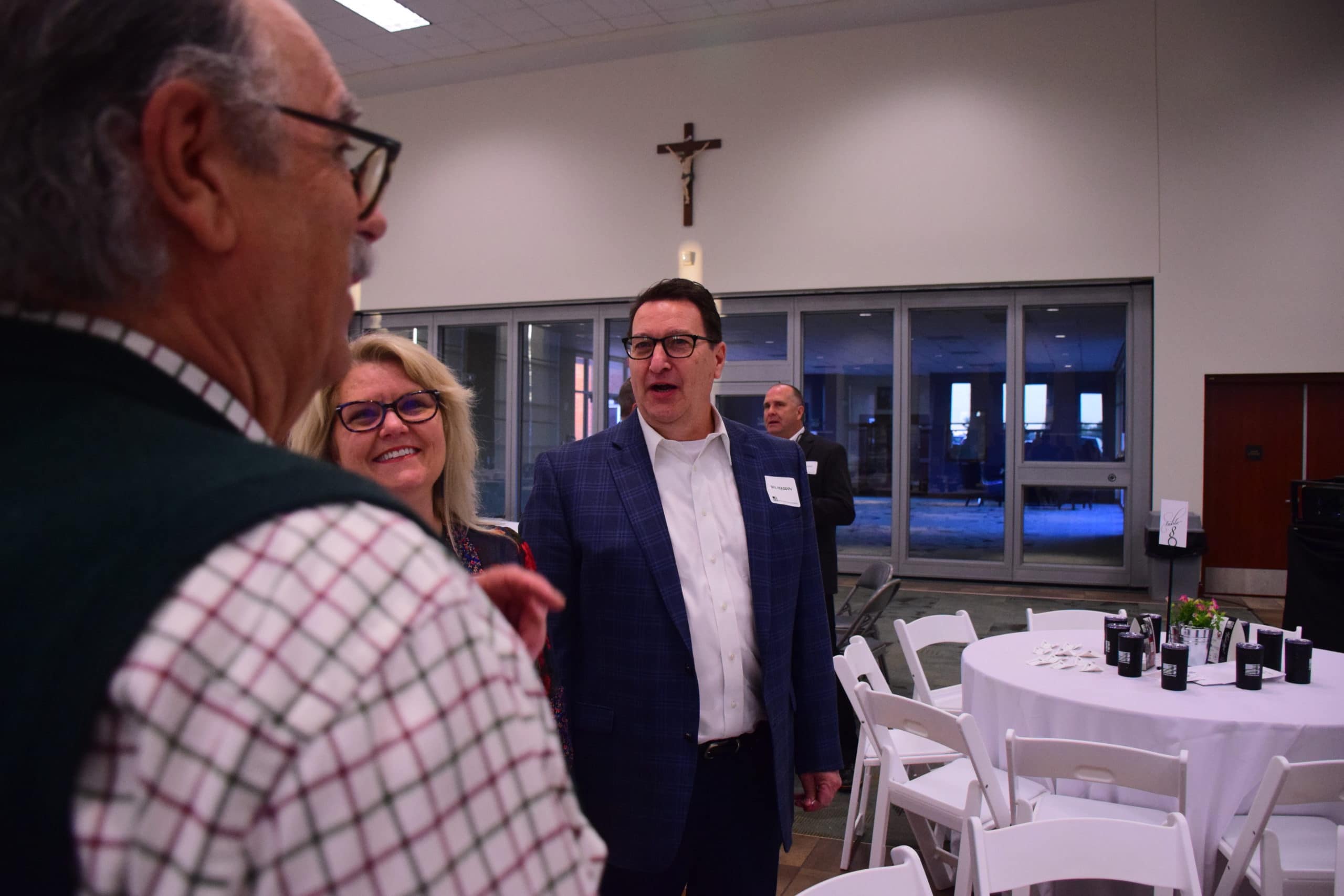 Neil Headden strikes up a conversation at the 2022 Million Meal Spring Breakfast.