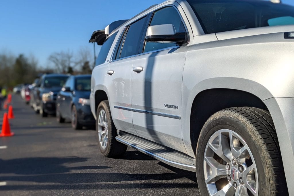 Cars lined up at a OneGenAway Mobile Pantry food distribution