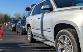 Cars lined up at a OneGenAway Mobile Pantry food distribution